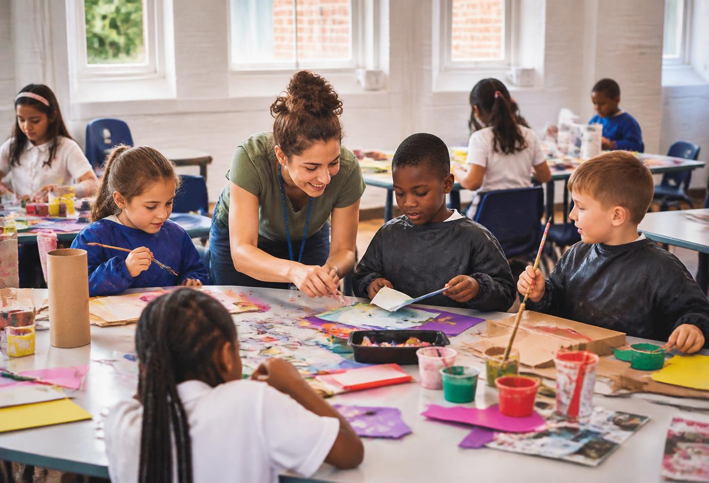 Children making colourful art during a creative activity